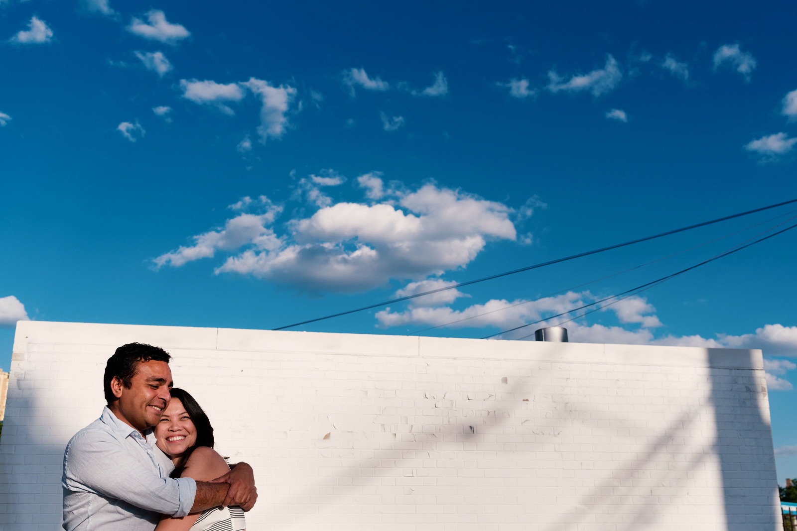 Bride and Groom engagement shoot blue sky Chicago